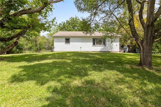 35365 Block Rd, Paola, KS 66071 - rear view of house with a lawn
