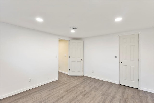 35365 Block Rd, Paola, KS 66071 - unfurnished room with wood finished floors and recessed lighting