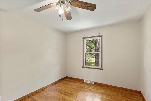 35365 Block Rd, Paola, KS 66071 - empty room featuring light wood-style flooring and a ceiling fan