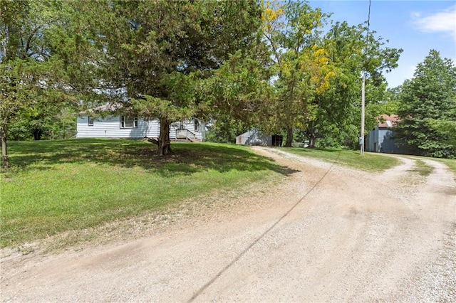 35365 Block Rd, Paola, KS 66071 - view of front of property with driveway, a front lawn, and an outbuilding