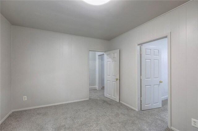 336 N 16th St, Kansas City, KS 66102 - spare room with carpet floors and baseboards