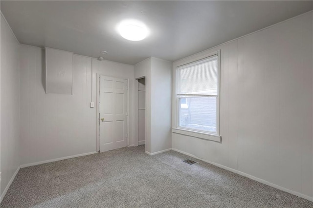 336 N 16th St, Kansas City, KS 66102 - unfurnished bedroom with carpet floors and a closet
