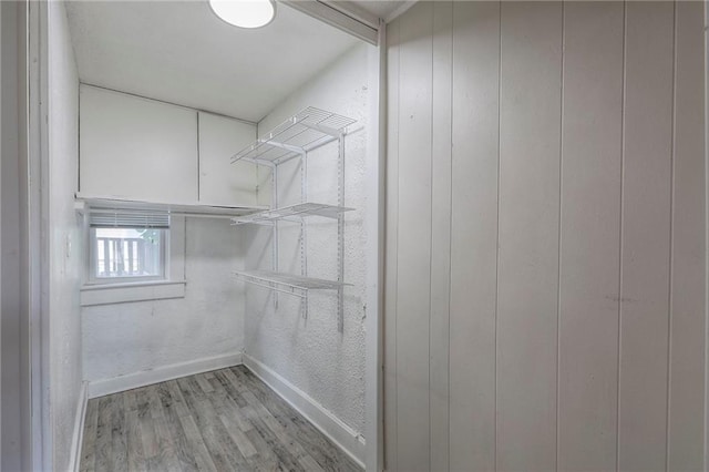 336 N 16th St, Kansas City, KS 66102 - walk in closet featuring light wood-style flooring