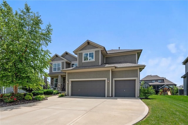24631 W 126th St, Olathe, KS 66061 - view of front of house featuring concrete driveway, stucco siding, a garage, and a front yard