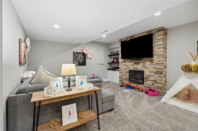 24631 W 126th St, Olathe, KS 66061 - carpeted living area with a stone fireplace and recessed lighting