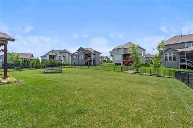 24631 W 126th St, Olathe, KS 66061 - fenced backyard featuring a trampoline and a residential view