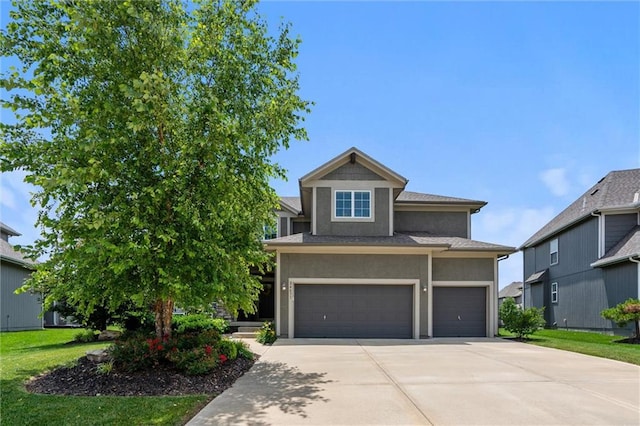 24631 W 126th St, Olathe, KS 66061 - view of front of house with driveway, stucco siding, a garage, and a front yard