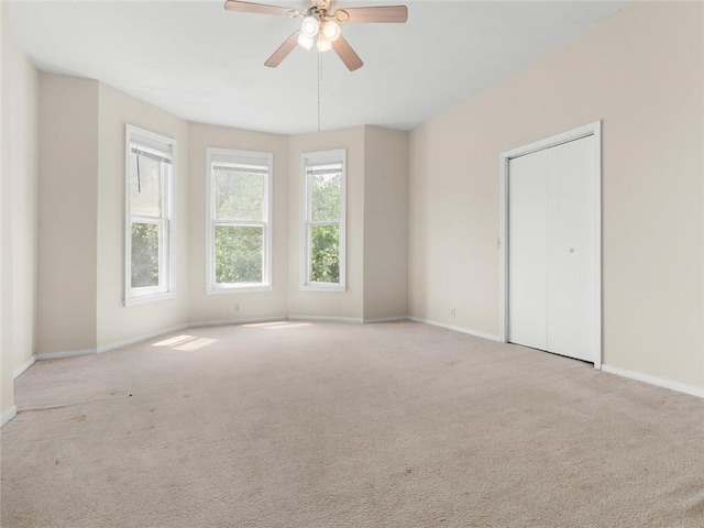 2703 Olive St, Saint Joseph, MO 64507 - spare room featuring carpet floors and a ceiling fan