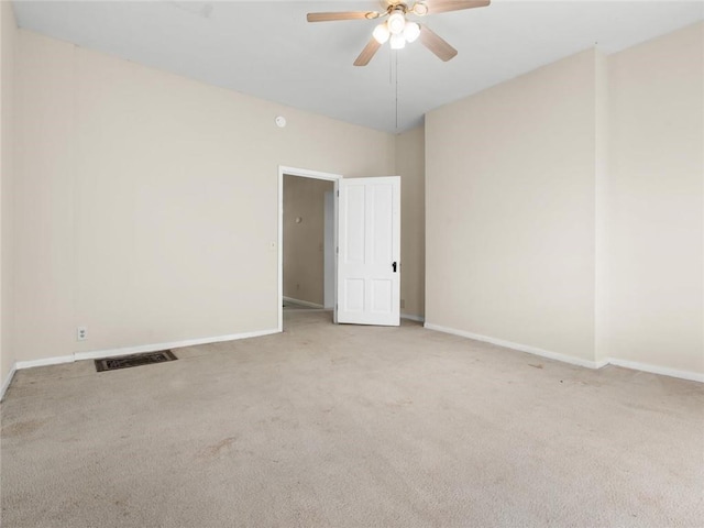 2703 Olive St, Saint Joseph, MO 64507 - spare room with carpet and a ceiling fan