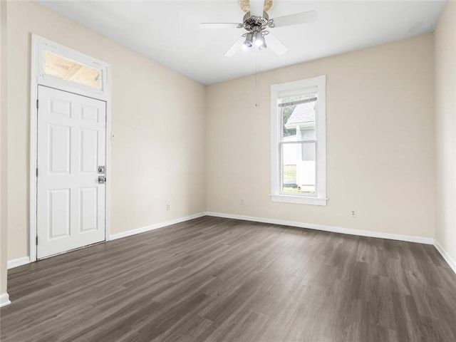 2703 Olive St, Saint Joseph, MO 64507 - empty room featuring dark wood-style floors and ceiling fan