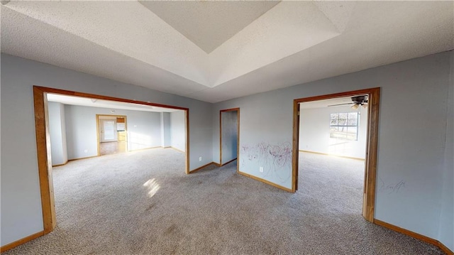 526 S W St, Nevada, MO 64772 - empty room with carpet floors and a textured ceiling