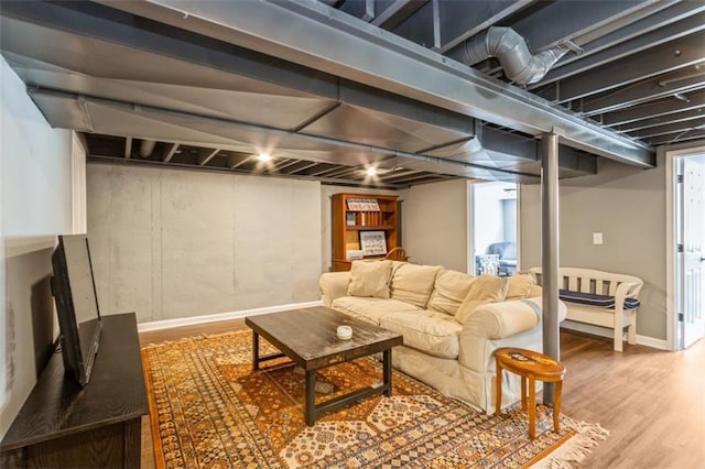 7718 Pawnee St, Prairie Village, KS 66208 - living area featuring wood finished floors and baseboards