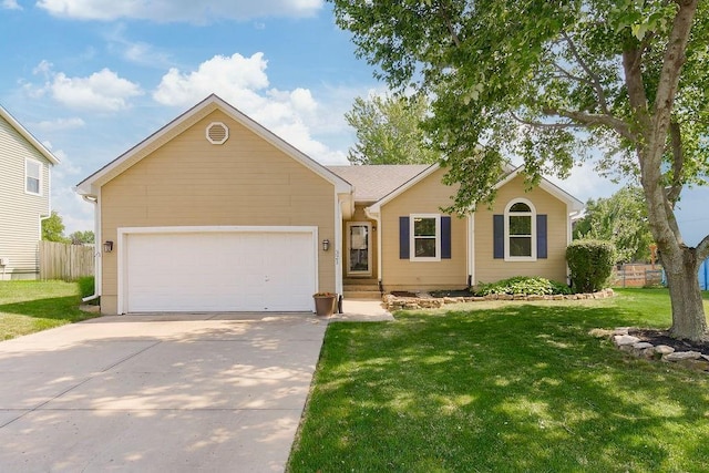 321 W Mockingbird St, Gardner, KS 66030 - ranch-style home with a garage and driveway