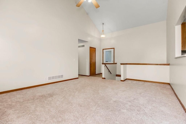 321 W Mockingbird St, Gardner, KS 66030 - spare room featuring carpet flooring, a ceiling fan, and high vaulted ceiling