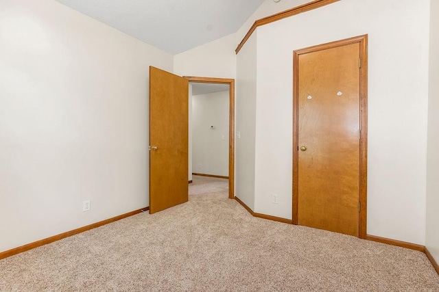 321 W Mockingbird St, Gardner, KS 66030 - empty room with carpet floors and lofted ceiling