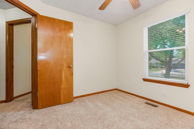 321 W Mockingbird St, Gardner, KS 66030 - spare room with carpet and a ceiling fan