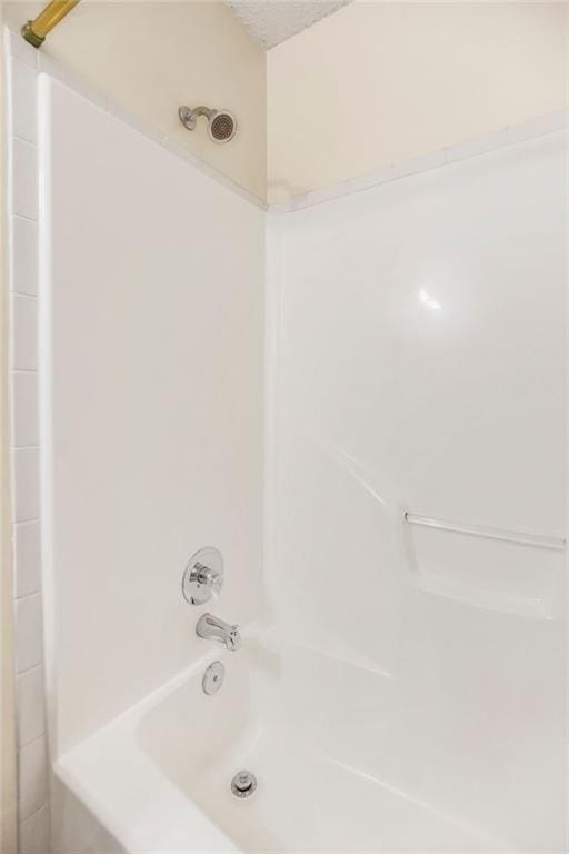 321 W Mockingbird St, Gardner, KS 66030 - full bath featuring  shower combination