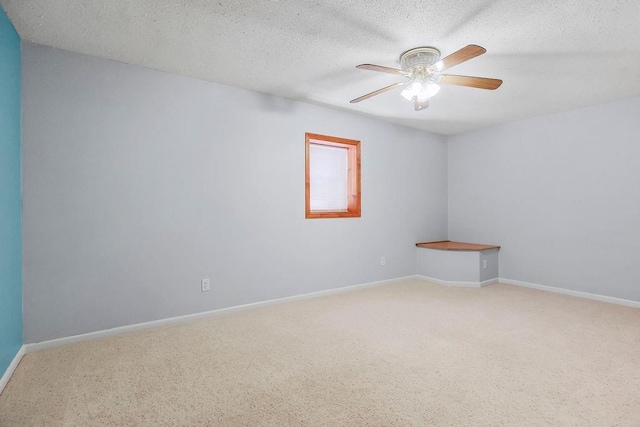 321 W Mockingbird St, Gardner, KS 66030 - carpeted spare room featuring ceiling fan and a textured ceiling