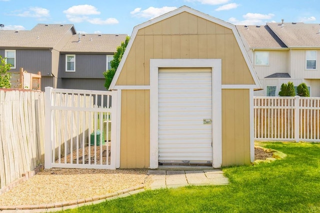 321 W Mockingbird St, Gardner, KS 66030 - view of shed with a fenced backyard