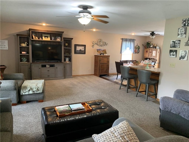 517 Brooklyn Ct, Frontenac, KS 66763 - carpeted living area with ceiling fan and baseboards