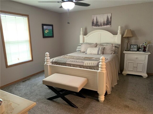 517 Brooklyn Ct, Frontenac, KS 66763 - carpeted bedroom featuring baseboards and a ceiling fan