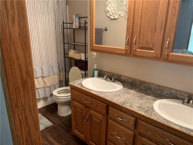 517 Brooklyn Ct, Frontenac, KS 66763 - bathroom featuring wood finished floors and double vanity