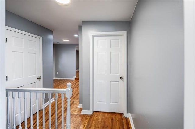 3620 Smart Ave, Kansas City, MO 64124 - hallway featuring wood finished floors and recessed lighting