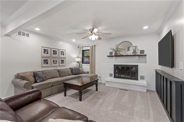 8039 Kessler St, Overland Park, KS 66204 - carpeted living room with crown molding, ceiling fan, a glass covered fireplace, and recessed lighting