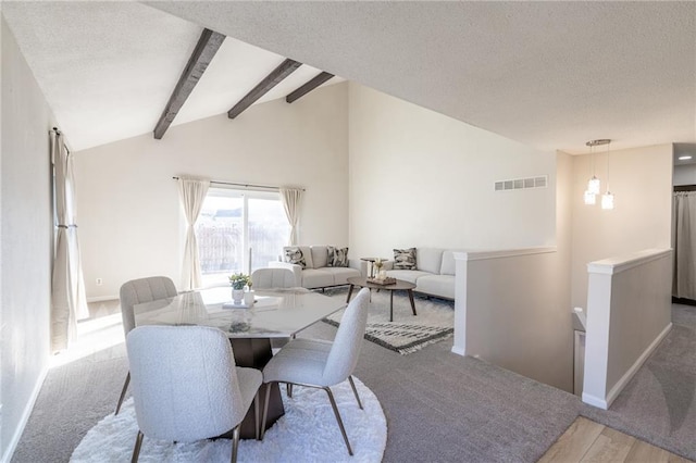 911 SE Hampton Ct, Lees Summit, MO 64063 - dining area featuring wood finished floors and a textured ceiling
