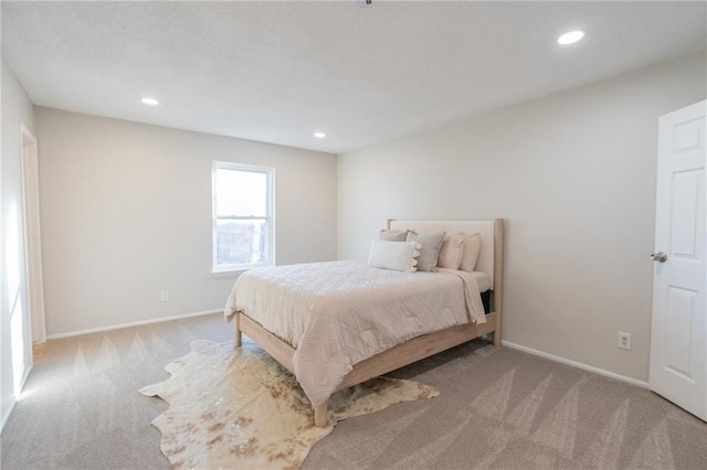 911 SE Hampton Ct, Lees Summit, MO 64063 - carpeted bedroom with recessed lighting