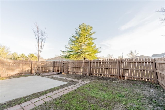 911 SE Hampton Ct, Lees Summit, MO 64063 - fenced backyard featuring a patio
