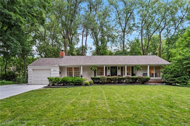 8315 Sagamore Rd, Leawood, KS 66206 - ranch-style home with a chimney, covered porch, concrete driveway, a garage, and a front yard