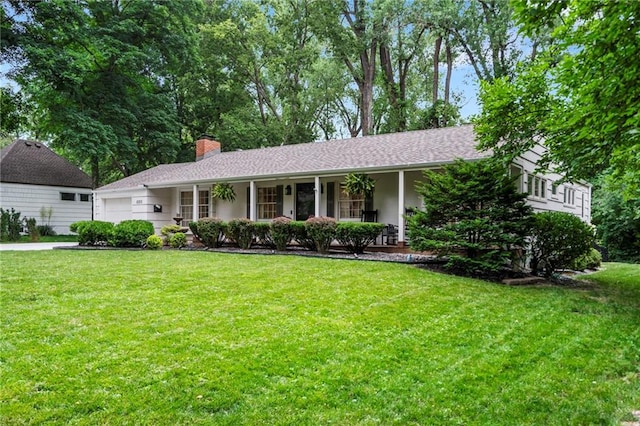 8315 Sagamore Rd, Leawood, KS 66206 - ranch-style house with an attached garage, a front yard, a chimney, and covered porch