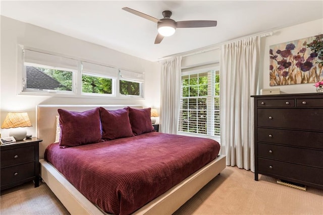 8315 Sagamore Rd, Leawood, KS 66206 - bedroom featuring light colored carpet and a ceiling fan