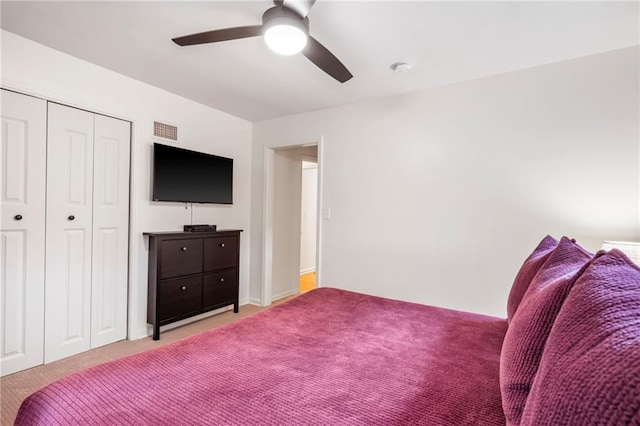 8315 Sagamore Rd, Leawood, KS 66206 - carpeted bedroom with a closet and ceiling fan