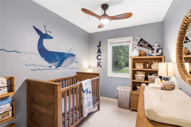 8315 Sagamore Rd, Leawood, KS 66206 - bedroom featuring a crib, carpet flooring, and ceiling fan