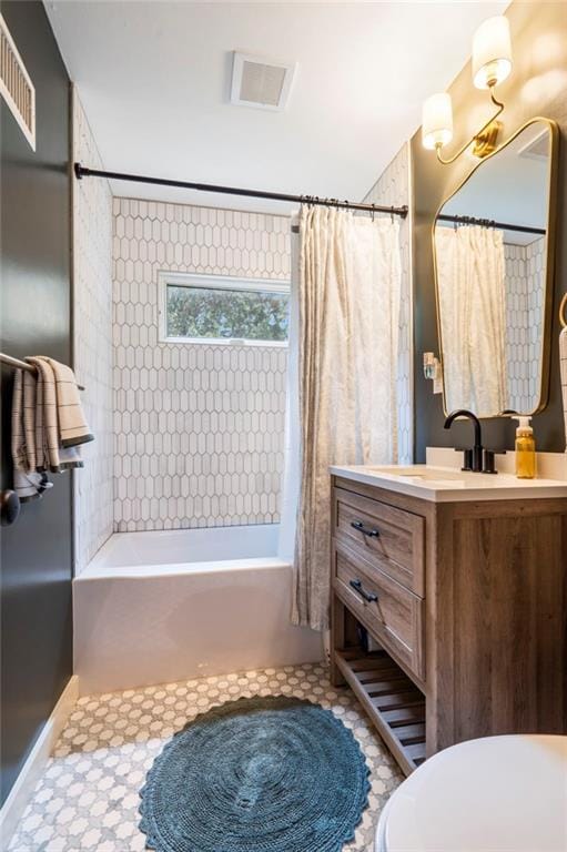 8315 Sagamore Rd, Leawood, KS 66206 - full bath featuring vanity, shower / tub combo with curtain, and tile patterned floors