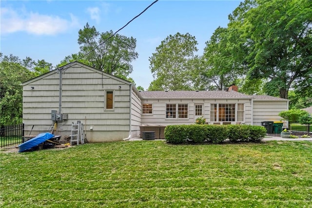 8315 Sagamore Rd, Leawood, KS 66206 - rear view of property featuring a chimney