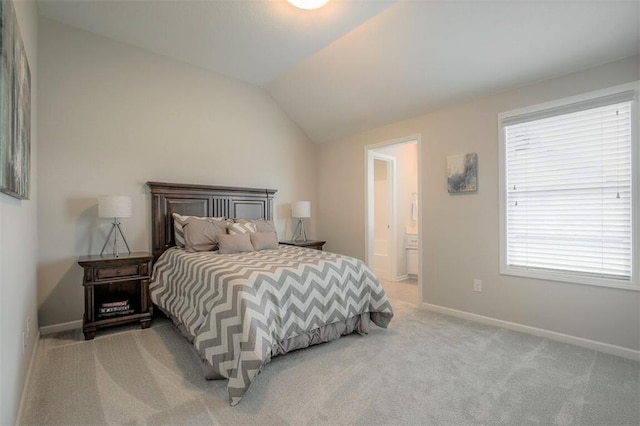 18421 Caenen St, Overland Park, KS 66013 - bedroom with light carpet, vaulted ceiling, and ensuite bath