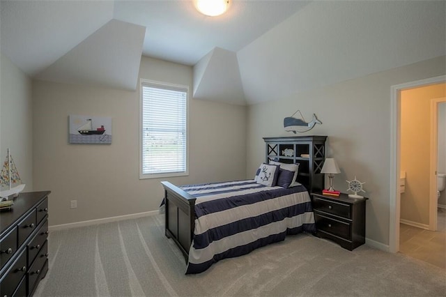 18421 Caenen St, Overland Park, KS 66013 - carpeted bedroom featuring vaulted ceiling and baseboards
