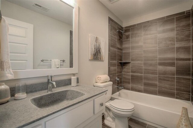 18421 Caenen St, Overland Park, KS 66013 - bathroom with vanity and bathtub / shower combination