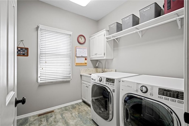 21502 W 98th Ter, Lenexa, KS 66220 - laundry room with separate washer and dryer and cabinet space