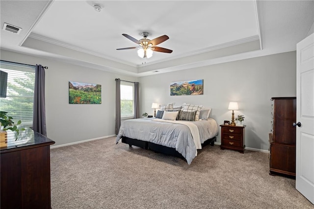 21502 W 98th Ter, Lenexa, KS 66220 - bedroom with a raised ceiling, light carpet, crown molding, and ceiling fan