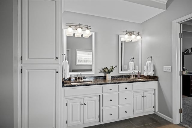 21502 W 98th Ter, Lenexa, KS 66220 - bathroom featuring double vanity and wood finish floors