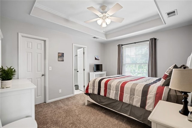 21502 W 98th Ter, Lenexa, KS 66220 - carpeted bedroom featuring a tray ceiling, crown molding, and a ceiling fan