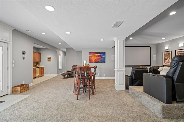 21502 W 98th Ter, Lenexa, KS 66220 - dining room featuring ornate columns, light colored carpet, and recessed lighting
