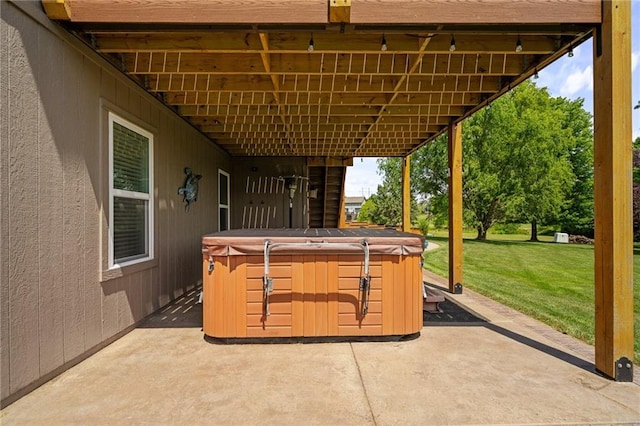 21502 W 98th Ter, Lenexa, KS 66220 - view of patio / terrace featuring a hot tub