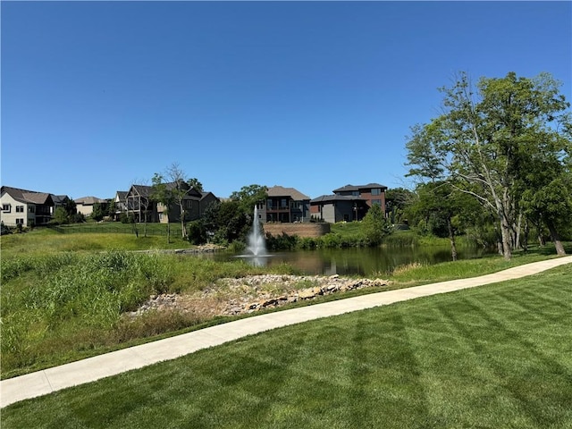 22415 87th Ter, Lenexa, KS 66227 - view of grassy yard with a water view and a residential view