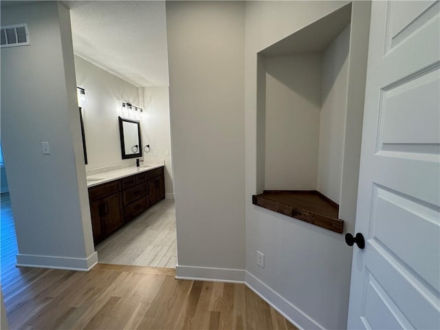 22415 87th Ter, Lenexa, KS 66227 - mudroom with light wood-style floors and baseboards