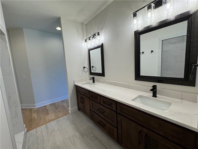 22415 87th Ter, Lenexa, KS 66227 - full bath featuring double vanity and baseboards